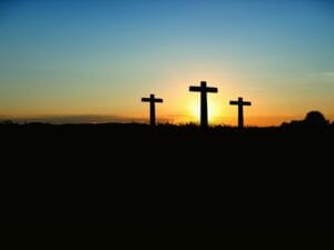 crosses at sunset on mountain