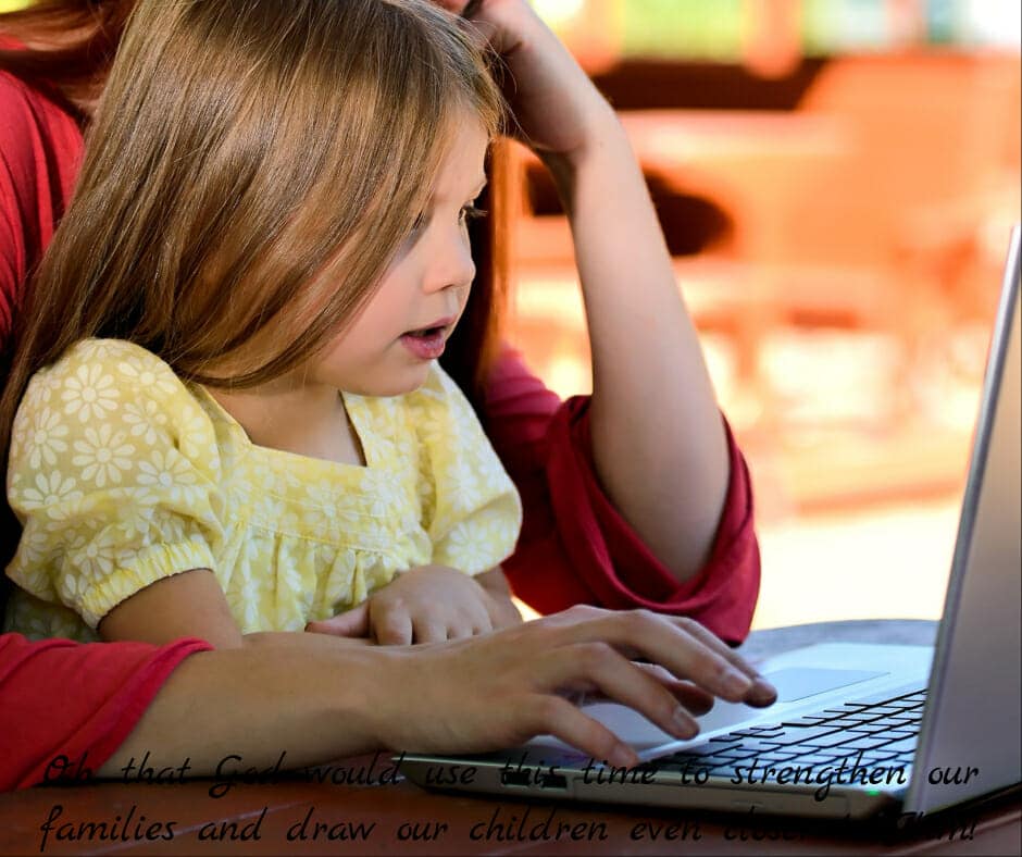 young girl with mom on laptop computer