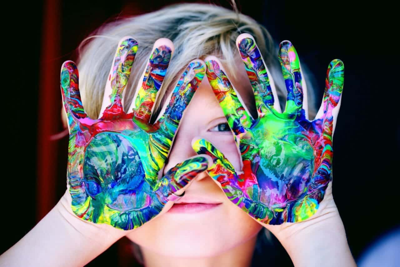boy with paint on hands