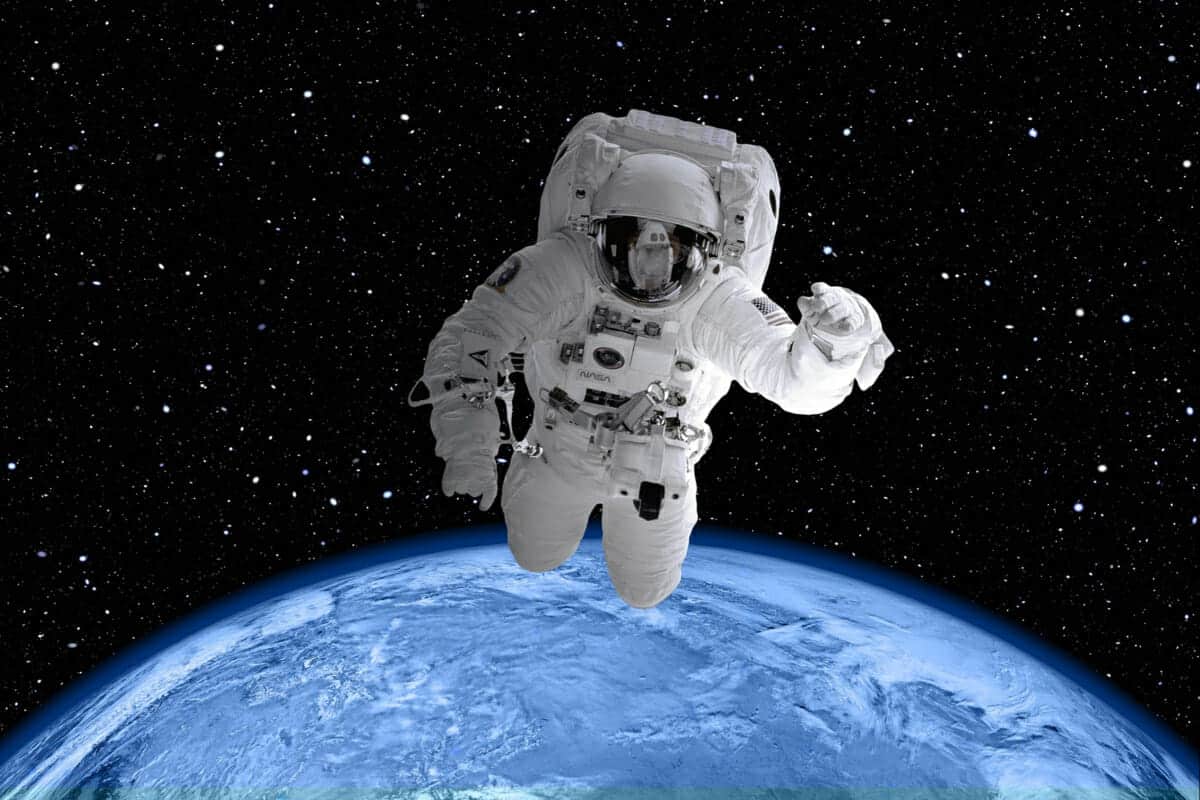 spaceman in space with earth