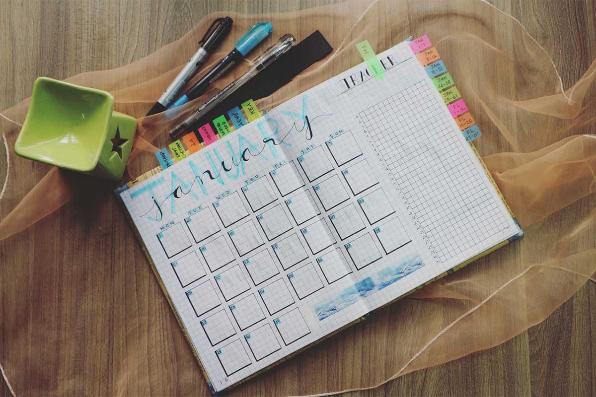 Cute monthly planner with colored pens